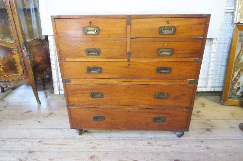 A 19th century two section military/campaign chest, with brass fittings, fitted with five drawers,