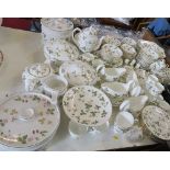 A large collection of Wedgwood dinner and tea ware, Wild Strawberry pattern, comprising various