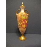 A Royal Worcester covered slender vase, decorated with hand painted fruit by Freeman, shape 2710/