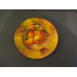 A Royal Worcester side plate, decorated with hand painted fruit by Aryton, diameter approx