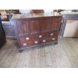 An antique oak mule chest