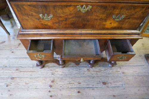 An 18th century walnut chest on stand, having two short drawers, over three long graduated long - Image 6 of 9