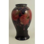 A large Moorcroft vase, decorated in the pomegranate pattern, height 9insCondition Report: Good