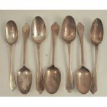 Seven mid 18th century silver trifid end serving spoons, with rat tail to the bowls, all bottom