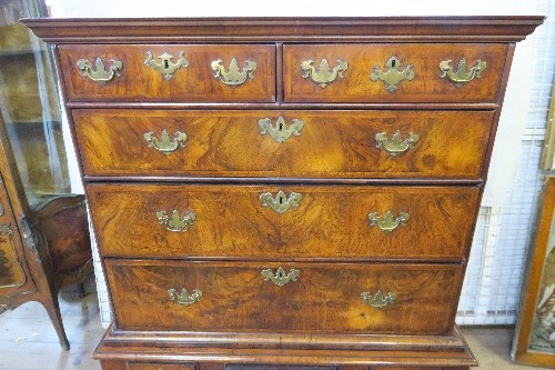 An 18th century walnut chest on stand, having two short drawers, over three long graduated long - Image 3 of 9