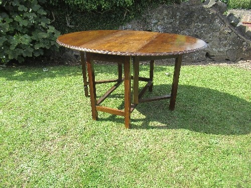 A Georgian style mahogany gate leg table