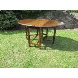 A Georgian style mahogany gate leg table