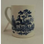 An 18th century blue and white Worcester mug, decorated with the Plantation pattern, height 3.