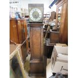 A 20th century oak cased long case clock, hood damaged