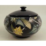 A Moorcroft covered globular pot, decorated in the Festive Lights pattern, with foliate decoration