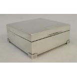 A silver cigarette box, of square form with engine turned decoration, Birmingham 1939, 3.25ins x 3.