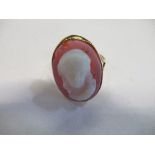 A hardstone cameo ring, stamped '9ct', carved wtih a classical femal head, finger size P, 3.2g