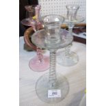 Three glass candle sticks