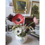 A Royal Worcester three handled pot, moulded with leaves, together with various porcelain flowers