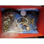 A collection of costume jewellery, to include a silver ingot, watches, earrings etc