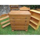 Four various shelves and a chest of drawers