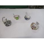 A silver and green stone ring, 4g gross, together two other silver rings set with stones, both 5g
