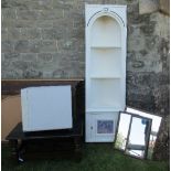 A tall white painted corner unit, with open shelves and cupboard to base, together with three