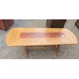 A G-plan coffee table, with leather panels to the top, 55.5ins x 20.5ins x height 17.5ins
