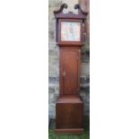An Antique oak cased long case clock, with painted dial inscribed Owns Wimeswold
