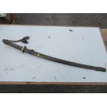 A World War II Japanese Warrant Officer's general issue sword, with moulded metal  handle, sword