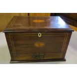 An Edwardian mahogany stationary box, decorated with paterea and line inlay, the rising lid