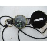 A YCM Japan compass, in black lacquer case, marked Lensatic Compass