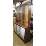 A large glazed unit, with three glazed doors to the upper section, width 72ins, height 90ins,