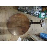 An Antique tripod table, with circular tilting top, af, diameter 30ins and a tapestry fire screen
