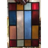 8 leaded glass panels, 9ins x 6.25ins, together with an oval tray, maximum diameter 16ins