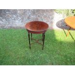 An Edwardian mahogany circular table, having inlaid top, raised on reeded legs, diameter 24ins x