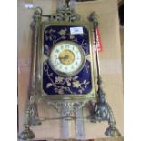 A 19th century Aesthetic movement mantel clock. the movement with enamel chapter ring set in a