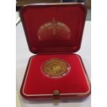 A cased Beit Al Koran commemorative gold medal, weight 10.9g