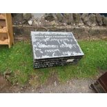 A tin trunk with stencilled words, 30ins x 22ins x height 12ins