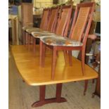 A 20th century G Plan extending dining table, together with six dining chairs