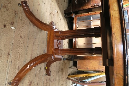 An oval walnut loo table, with ebonised and satinwood inlay, raised on a modern mahogany base, - Image 3 of 3