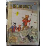 A Daily Express Rupert album, together with two Bunty albums, two autograph books, another book