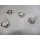 Four silver rings, total weight 16g gross, all finger size N