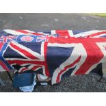 Four various sized Union Jack flags, and other bunting etc.