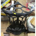 A black painted metal corner stick stand, height 22.5ins