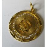 A 22 carat gold pendant with dragon motif, 6g gross
