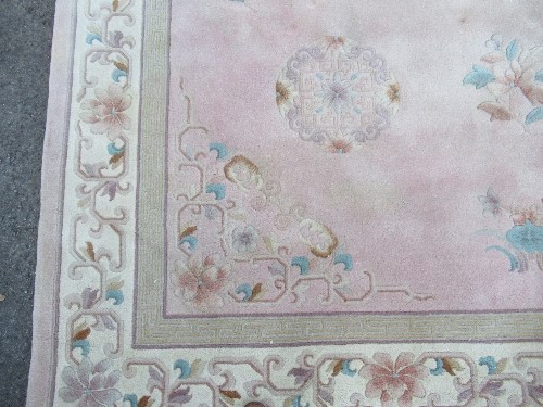 A Chinese wool wash rug, in pink, 122ins x 95.5ins - Image 2 of 2