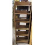 A tall bookcase, height 52ins, width 16ins, depth 6ins