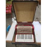 A cased Worldmaster accordion