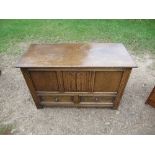 An oak mule chest, with carved front over two drawers, 39ins x 17ins x height 25ins