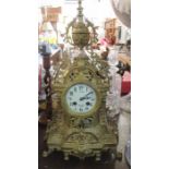 A late 19th century / early 20th century gilt clock, the dial marked G Sweron, 19.5ins