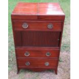 A 19th century mahogany wash stand, the double hinged top revealing compartments over a dummy