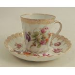 A Dresden porcelain gilded and floral painted cup and saucer, by Klemm, Donath & Co, together with