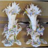 A pair of 19th century porcelain vases, encrusted with flowers, height 12ins