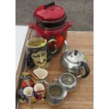 A collection of sundry items to include character jugs, tea set and a covered jar